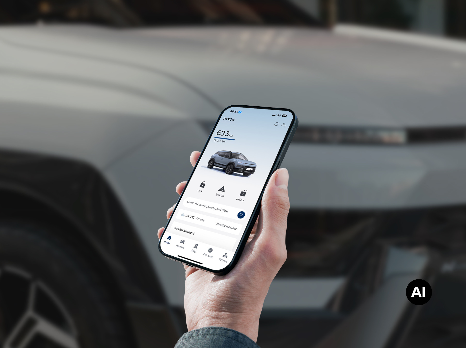 A close-up view of a hand holding a mobile phone with the background of the Hyundai BAYON N Line.