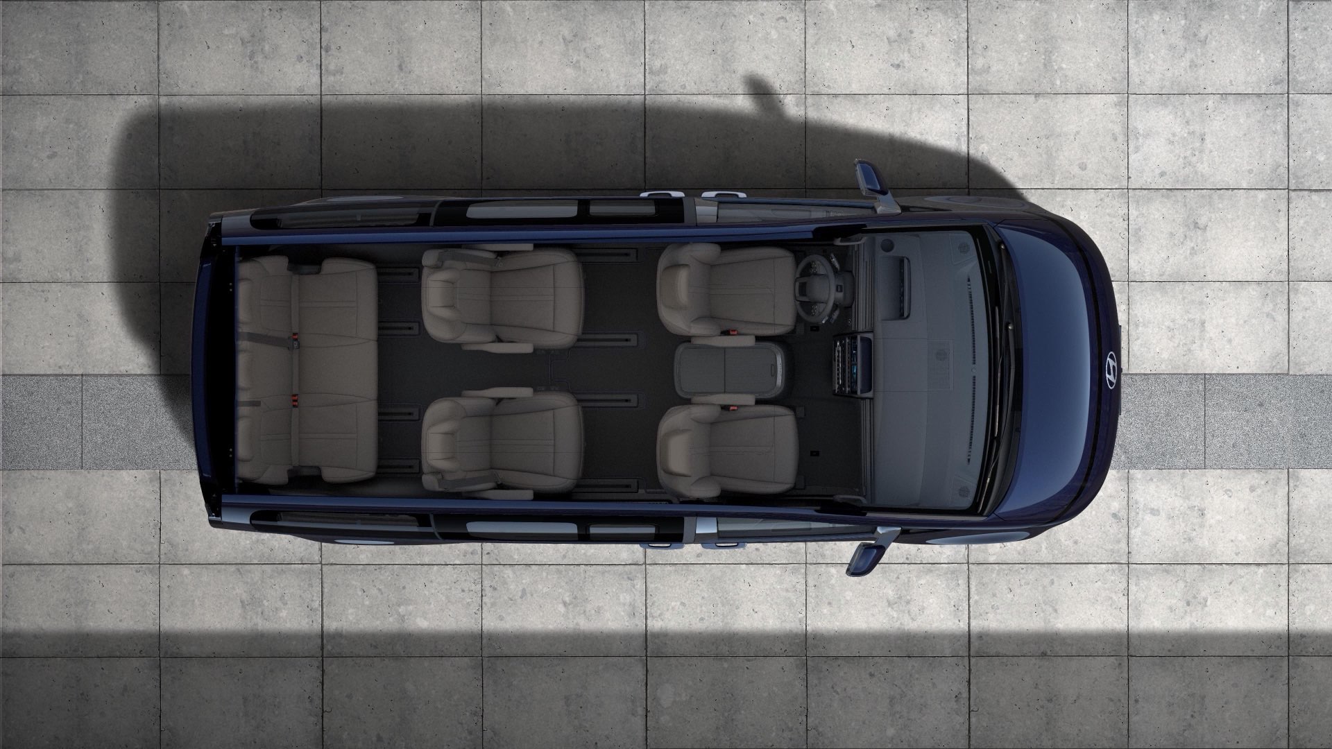 Hyundai STARIA Electric hétszemélyes üléselrendezése és tágas belső tere, felülnézetből.
