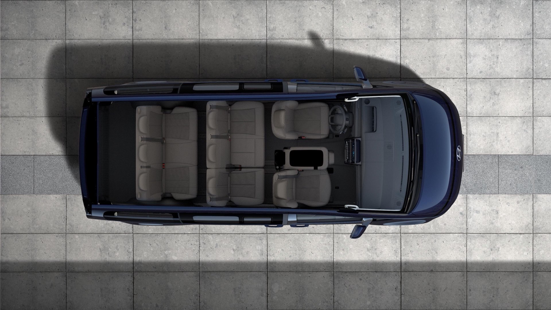 Hyundai STARIA Electric kilencszemélyes üléselrendezése és tágas belső tere, felülnézetből.